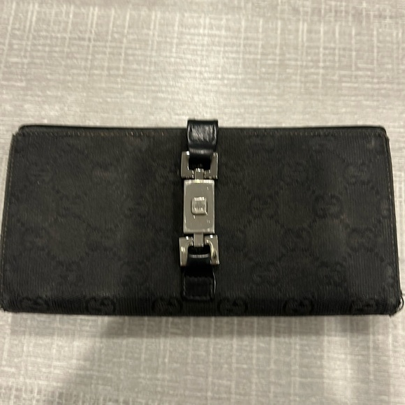 Authentic vintage Gucci wallet. Black with GG logo. Fair condition. Worn a littl - Picture 1 of 8